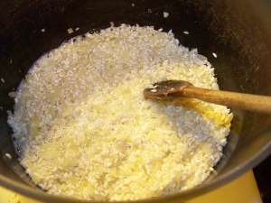 Stir until the rice is coated with butter and begins to turn glassy