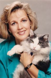 The Bride, with our late, much beloved cat Murray, who wasn't keen on photos.