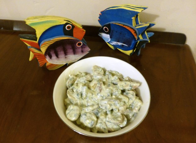 The finished salad, with wooden fish.