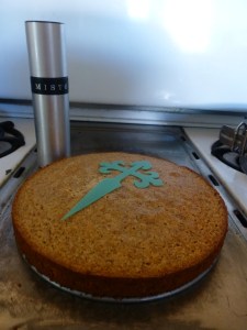 Out of the oven and ready for stenciling.  I use a spray bottle to apply the liquid, but a dish and pastry brush works fine too.